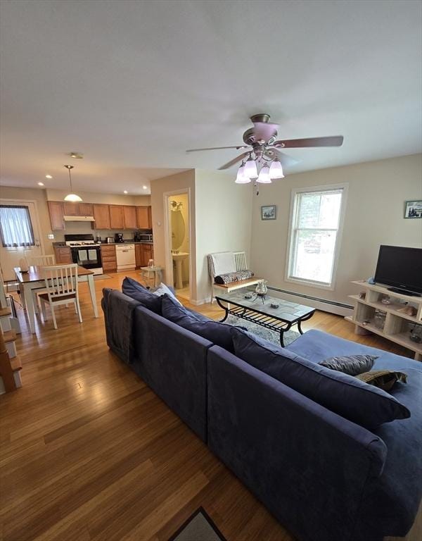 94 Barton St Unit 3, Pawtucket, RI 02860 - living room featuring light wood-style floors, ceiling fan, recessed lighting, and a baseboard heating unit