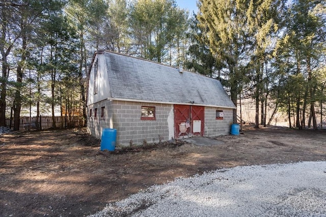 garage with fence