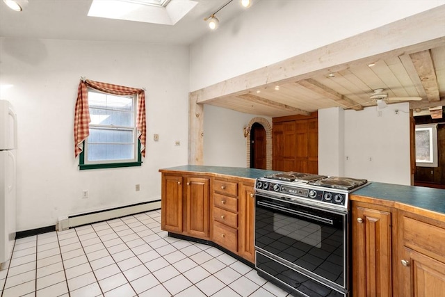 kitchen featuring dark countertops, electric range, brown cabinetry, and a baseboard radiator