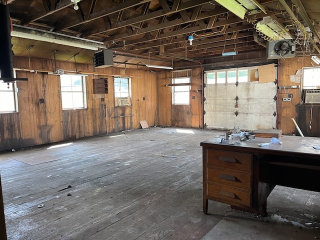 misc room featuring cooling unit and hardwood / wood-style flooring