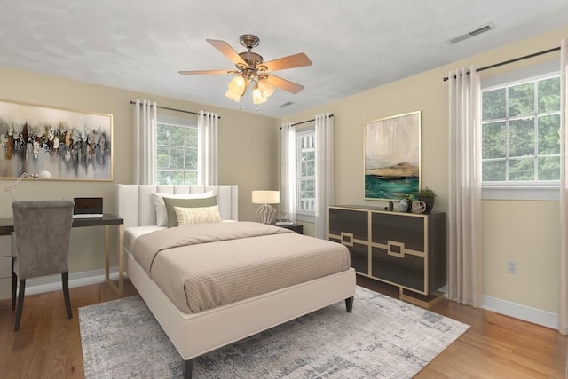 2 Dana Dr, Groveland, MA 01834 - bedroom with baseboards, wood finished floors, and ceiling fan