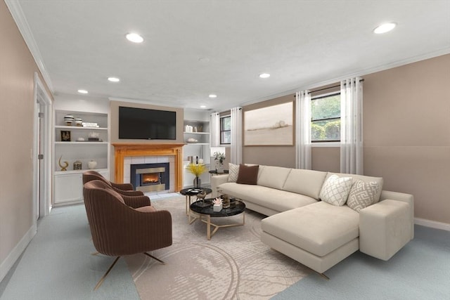 2 Dana Dr, Groveland, MA 01834 - living area with crown molding, recessed lighting, baseboards, a tiled fireplace, and built in shelves