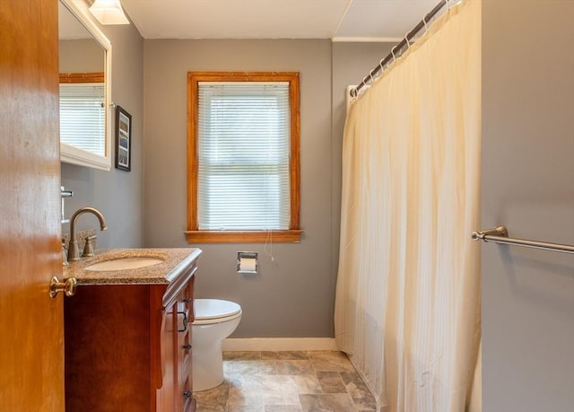 60 Highland Ave, Leominster, MA 01453 - bathroom featuring vanity, toilet, baseboards, and a shower with curtain
