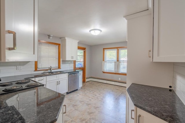 60 Highland Ave, Leominster, MA 01453 - kitchen featuring stainless steel dishwasher, a baseboard radiator, a sink, decorative backsplash, and dark stone counters