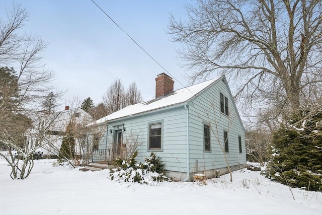 view of snow covered property