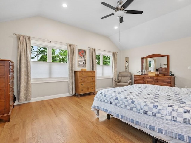 83 Boynton St, Waltham, MA 02453 - bedroom with vaulted ceiling, wood finished floors, baseboards, a ceiling fan, and recessed lighting