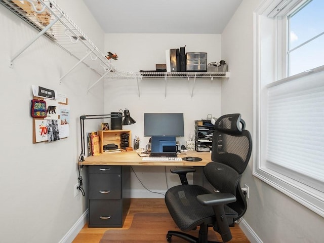 83 Boynton St, Waltham, MA 02453 - home office with wood finished floors and baseboards