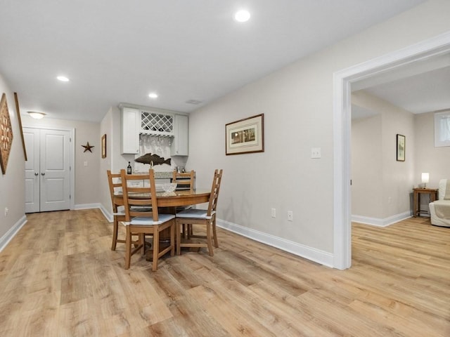 83 Boynton St, Waltham, MA 02453 - dining space featuring light wood-style flooring, recessed lighting, and baseboards
