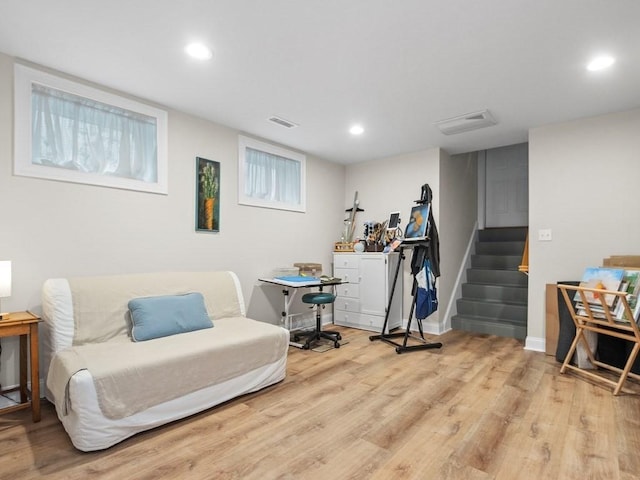 83 Boynton St, Waltham, MA 02453 - living area with light wood-style flooring, recessed lighting, stairs, and baseboards