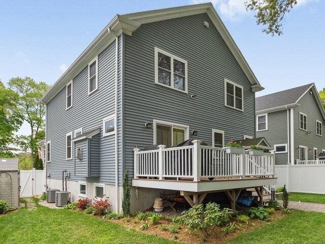 83 Boynton St, Waltham, MA 02453 - back of house with a wooden deck, a gate, and central air condition unit