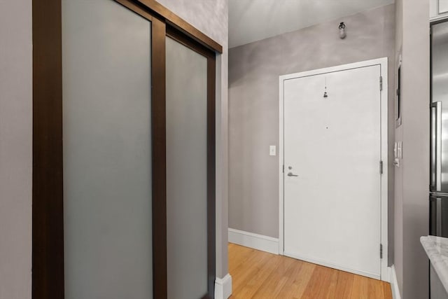 42 8th St Unit 4106, Boston, MA 02129 - entrance foyer featuring light wood-style floors and baseboards