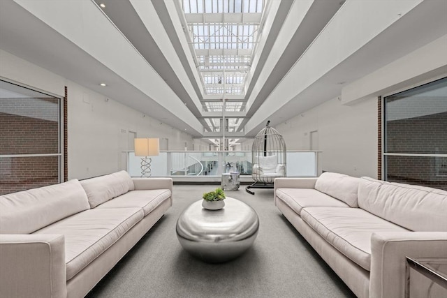 42 8th St Unit 4106, Boston, MA 02129 - living area with a towering ceiling and carpet