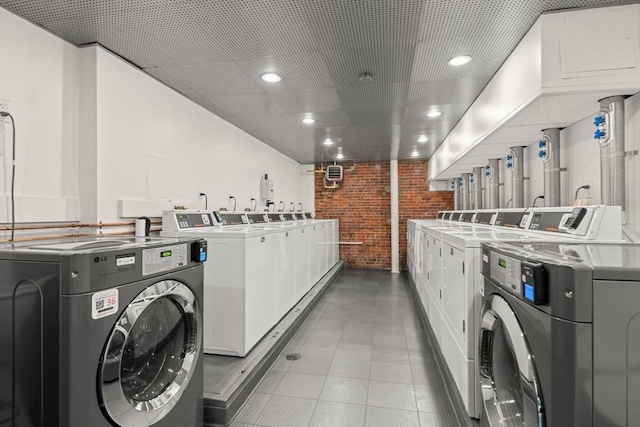 42 8th St Unit 4106, Boston, MA 02129 - shared laundry room featuring washer and clothes dryer, brick wall, and recessed lighting