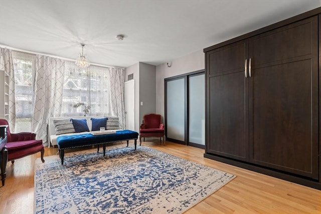 42 8th St Unit 4106, Boston, MA 02129 - sitting room featuring light wood-style floors and a chandelier