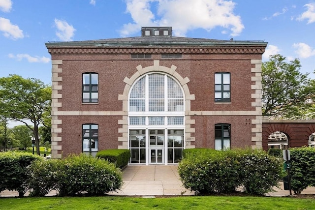 42 8th St Unit 4106, Boston, MA 02129 - back of house with brick siding and a patio area