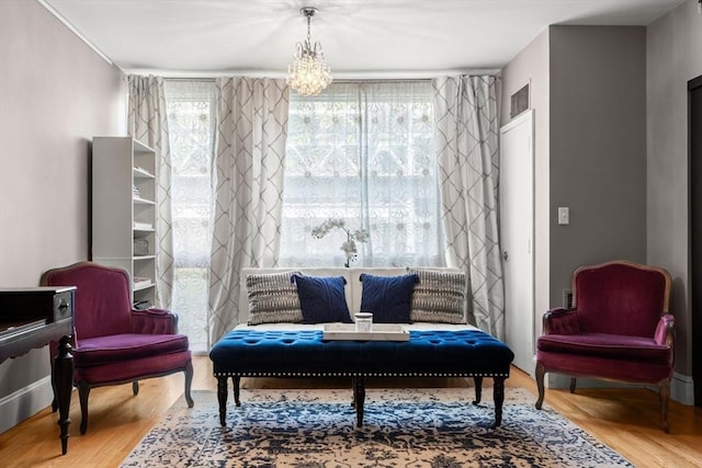 42 8th St Unit 4106, Boston, MA 02129 - sitting room featuring wood finished floors and a chandelier
