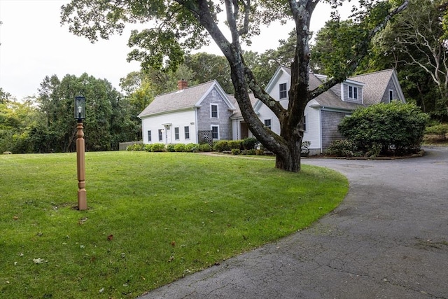 exterior space featuring a yard