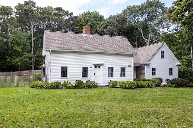 view of front of house with a front lawn