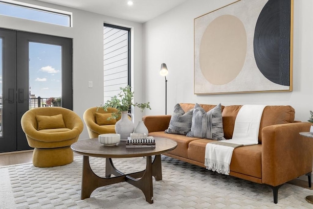 100 Lincoln St Unit 303, Boston, MA 02135 - living room featuring french doors, plenty of natural light, and recessed lighting