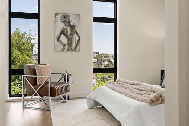 100 Lincoln St Unit 303, Boston, MA 02135 - bedroom with wood finished floors and baseboards