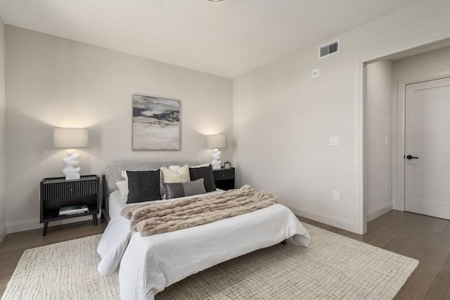100 Lincoln St Unit 303, Boston, MA 02135 - bedroom with wood finished floors and baseboards