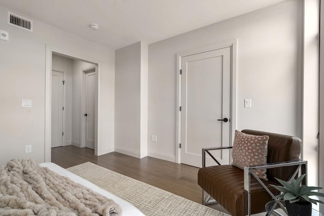100 Lincoln St Unit 303, Boston, MA 02135 - bedroom featuring wood finished floors and baseboards