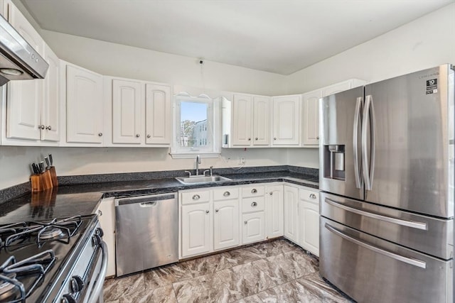 kitchen featuring a sink, white cabinetry, appliances with stainless steel finishes, and extractor fan