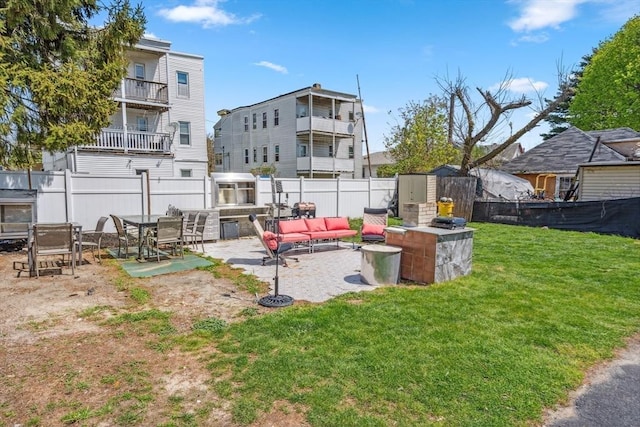 exterior space with fence, a patio, and an outdoor hangout area