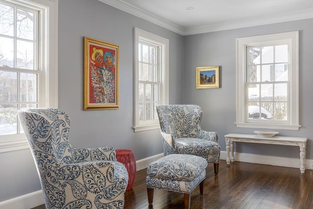 115 Rutledge, Belmont, MA 02478 - living area featuring healthy amount of natural light, wood-type flooring, baseboards, and crown molding
