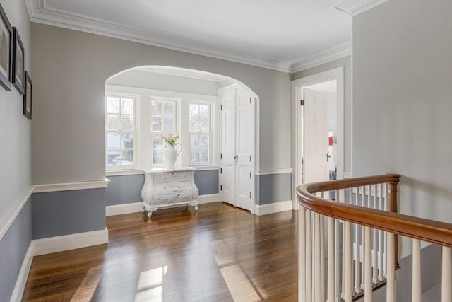 115 Rutledge, Belmont, MA 02478 - hall with wood finished floors, arched walkways, crown molding, baseboards, and an upstairs landing