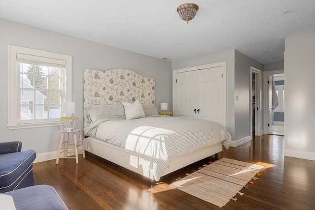 115 Rutledge, Belmont, MA 02478 - bedroom featuring wood finished floors, baseboards, and a closet