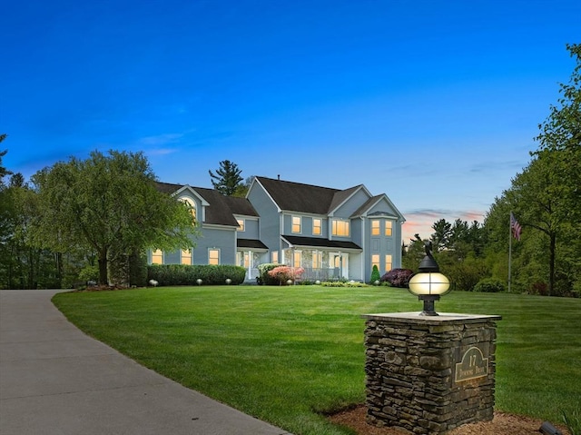 traditional home with a lawn