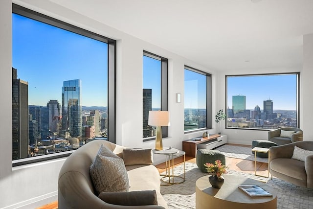 sunroom / solarium featuring a city view