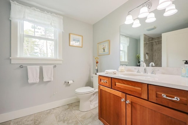 185 Read St, Seekonk, MA 02771 - full bath with baseboards, tiled shower, toilet, and vanity