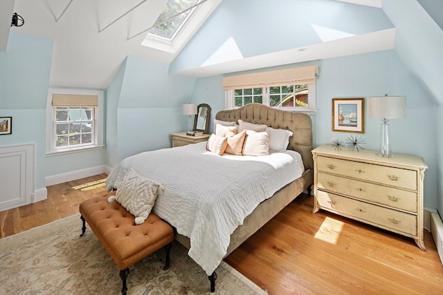 44 Ripley Hill Rd, Concord, MA 01742 - bedroom featuring a skylight, lofted ceiling, and wood finished floors
