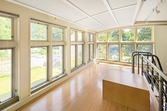 44 Ripley Hill Rd, Concord, MA 01742 - unfurnished sunroom featuring wood-type flooring and beam ceiling