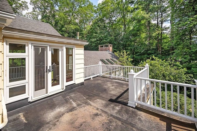 44 Ripley Hill Rd, Concord, MA 01742 - view of patio featuring view of scattered trees and french doors