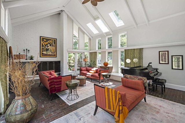 44 Ripley Hill Rd, Concord, MA 01742 - living room with high vaulted ceiling, a skylight, beamed ceiling, a ceiling fan, and brick flooring