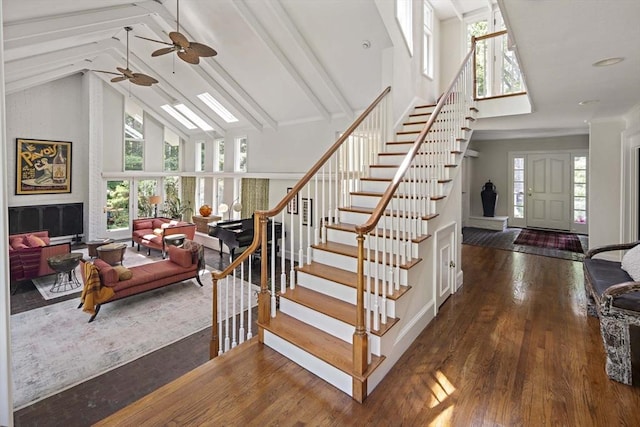 44 Ripley Hill Rd, Concord, MA 01742 - stairs featuring high vaulted ceiling, ceiling fan, wood-type flooring, and beamed ceiling