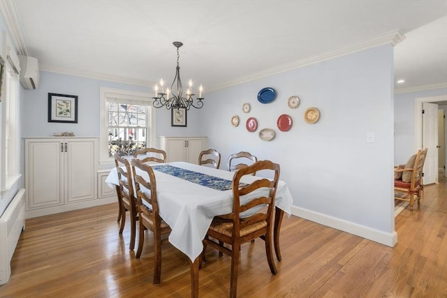 dining area featuring radiator, crown molding, light hardwood / wood-style flooring, an inviting chandelier, and a wall unit AC