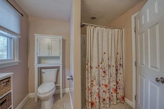 bathroom with toilet, tile patterned floors, a textured ceiling, and a shower with curtain