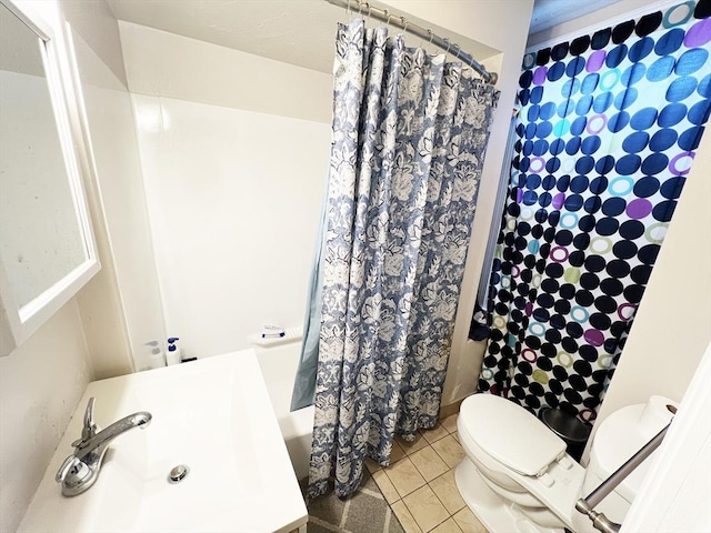 5-11 Monk St, Stoughton, MA 02072 - full bathroom featuring a sink, tile patterned flooring, toilet, and shower / bath combination with curtain