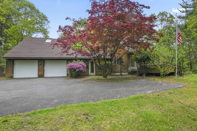 4 Fiske Mill Rd, Upton, MA 01568 - view of front facade featuring driveway, an attached garage, a front lawn, and roof with shingles