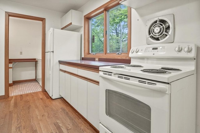 4 Fiske Mill Rd, Upton, MA 01568 - kitchen with white appliances, white cabinetry, and light wood-style floors