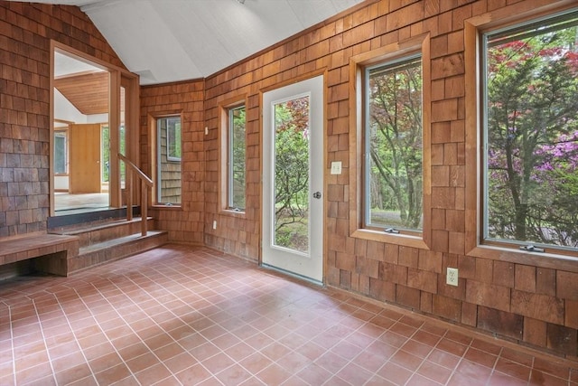 4 Fiske Mill Rd, Upton, MA 01568 - foyer with vaulted ceiling, tile patterned flooring, wooden walls, and plenty of natural light