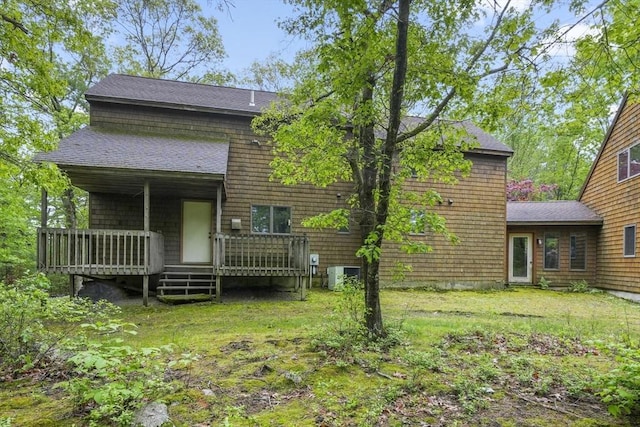 4 Fiske Mill Rd, Upton, MA 01568 - back of property featuring cooling unit, a deck, roof with shingles, and a yard
