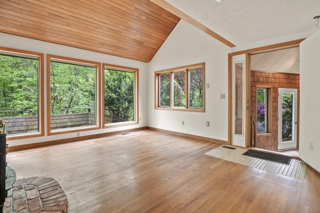 4 Fiske Mill Rd, Upton, MA 01568 - foyer featuring plenty of natural light, vaulted ceiling, wood-type flooring, and baseboards