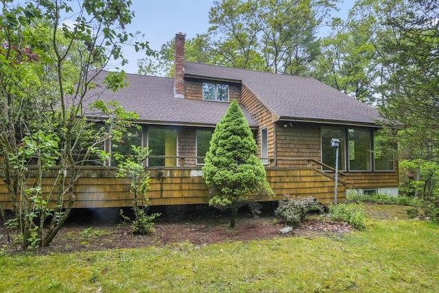 4 Fiske Mill Rd, Upton, MA 01568 - view of front of property with a shingled roof, a chimney, and a front yard