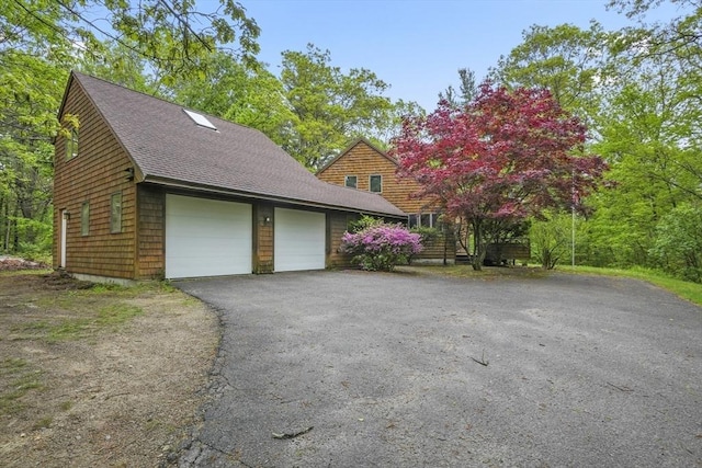 4 Fiske Mill Rd, Upton, MA 01568 - garage with asphalt driveway