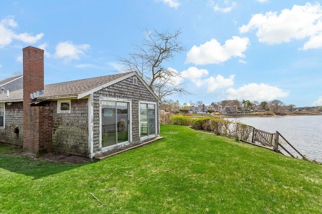 view of yard featuring a water view